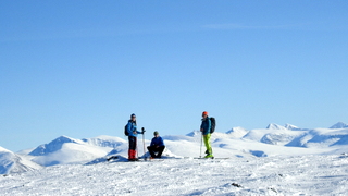 På toppen av Falketind. Rondane i bakgrunnen.